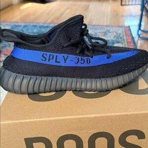Yeezy Black and Blue Athletic Shoes